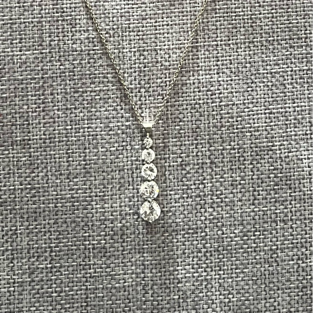 Elegant Silver-Tone Pendant Necklace with Clear Crystal Accents